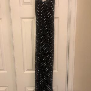 Black and white polka dot dress. Has a crossed back. Old navy